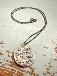 Image 12 of green sapphire pendant with handwritten quote