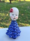 Sad Blue Baby Tree with Red Flower