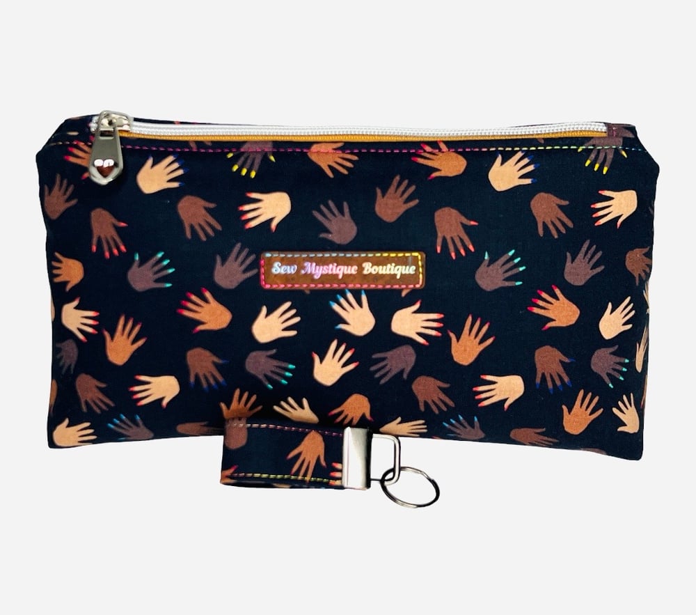 Image of Many Hands Cosmetic Bag