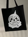 sad clown tote bag