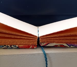 MARCUS — mini livre — reliure à la française