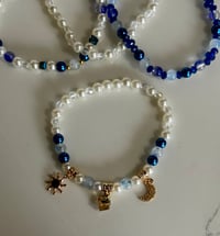 Image 5 of Cream & Blue Celestial Tumbler Bracelet Stack 
