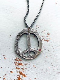 Image 1 of large paisley peace sign necklace