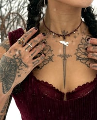 Image 11 of THE ‘LAMB MILAGRO’ GARNET NECKLACE 