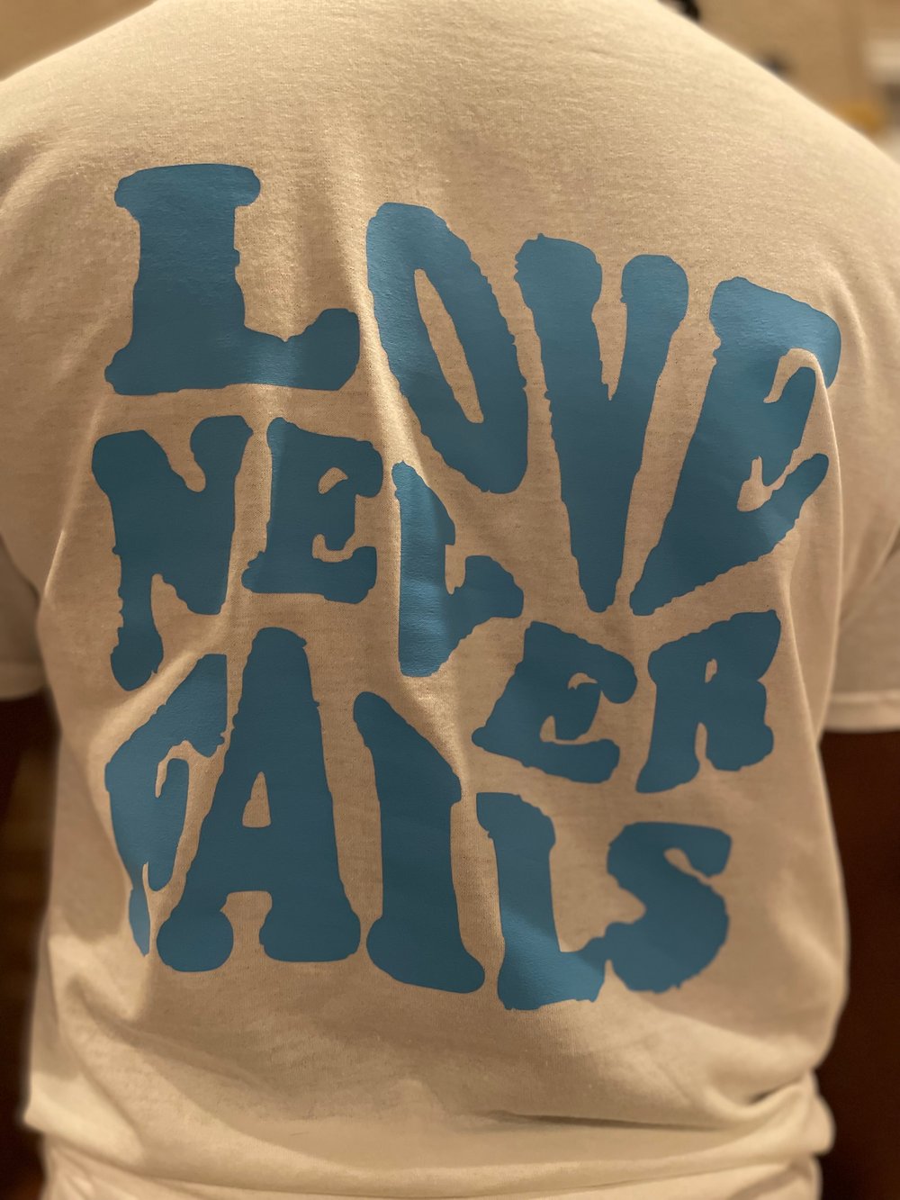 Love Never Fails (Blue)