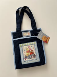 Image 1 of Pooh & friends mini hand diaper Bag 
