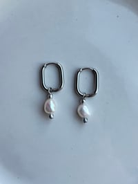 Image 1 of Stainless Steel Pearl Oval Huggies