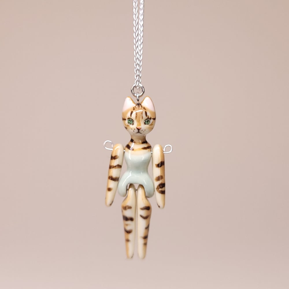 Image of Brown Tabby Porcelain & Sterling Silver Articulated Doll Pendant