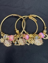 Gold hello kitty bangles