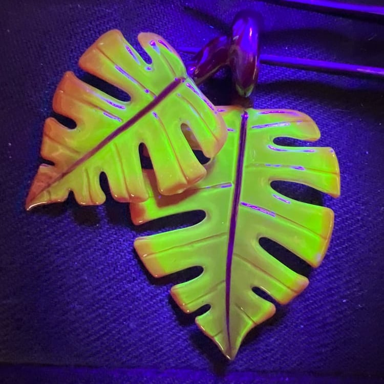 Image of Double Orange Sunburst Monstera Leaf Pendant