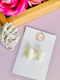 Image 1 of Ivory satin bow 