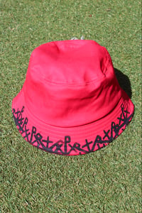 Image of too many bucket hat in red 