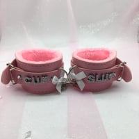 Cum Slut Pink/White Bow Handcuffs 