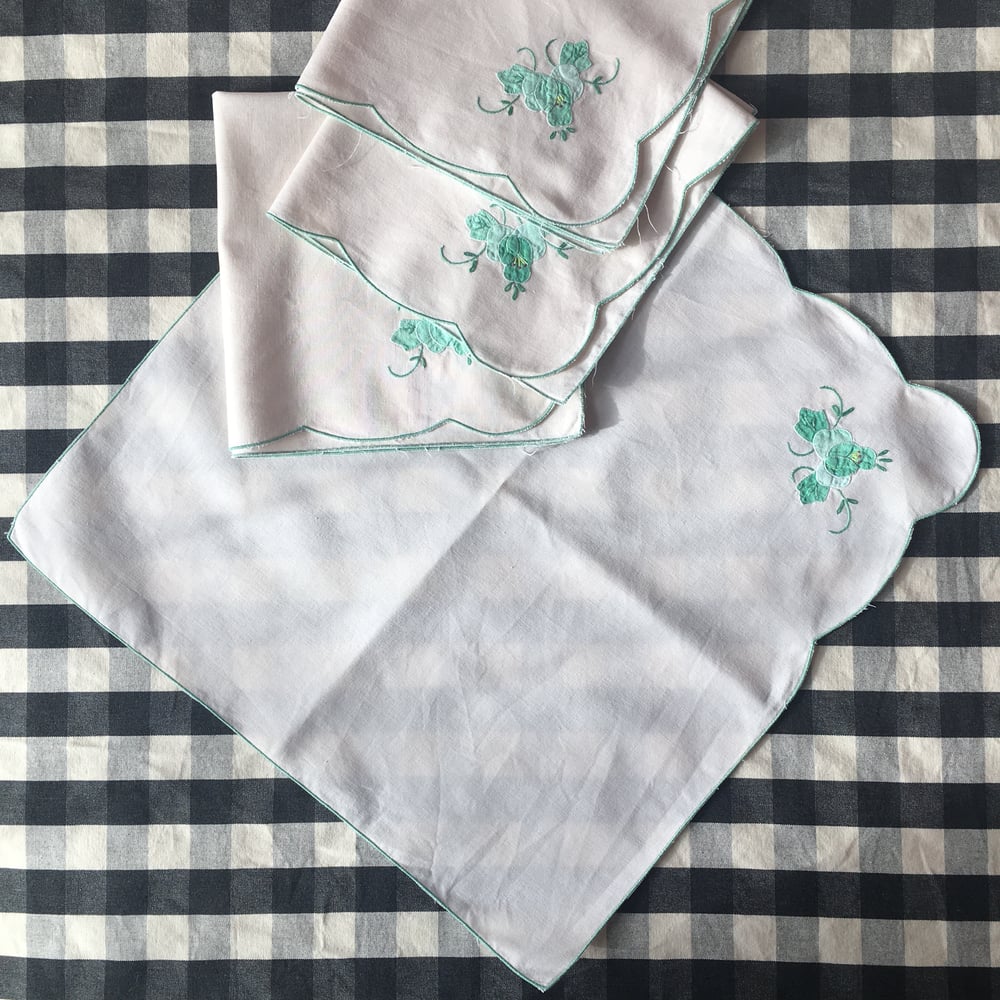Image of Aqua floral embroidered napkin set 