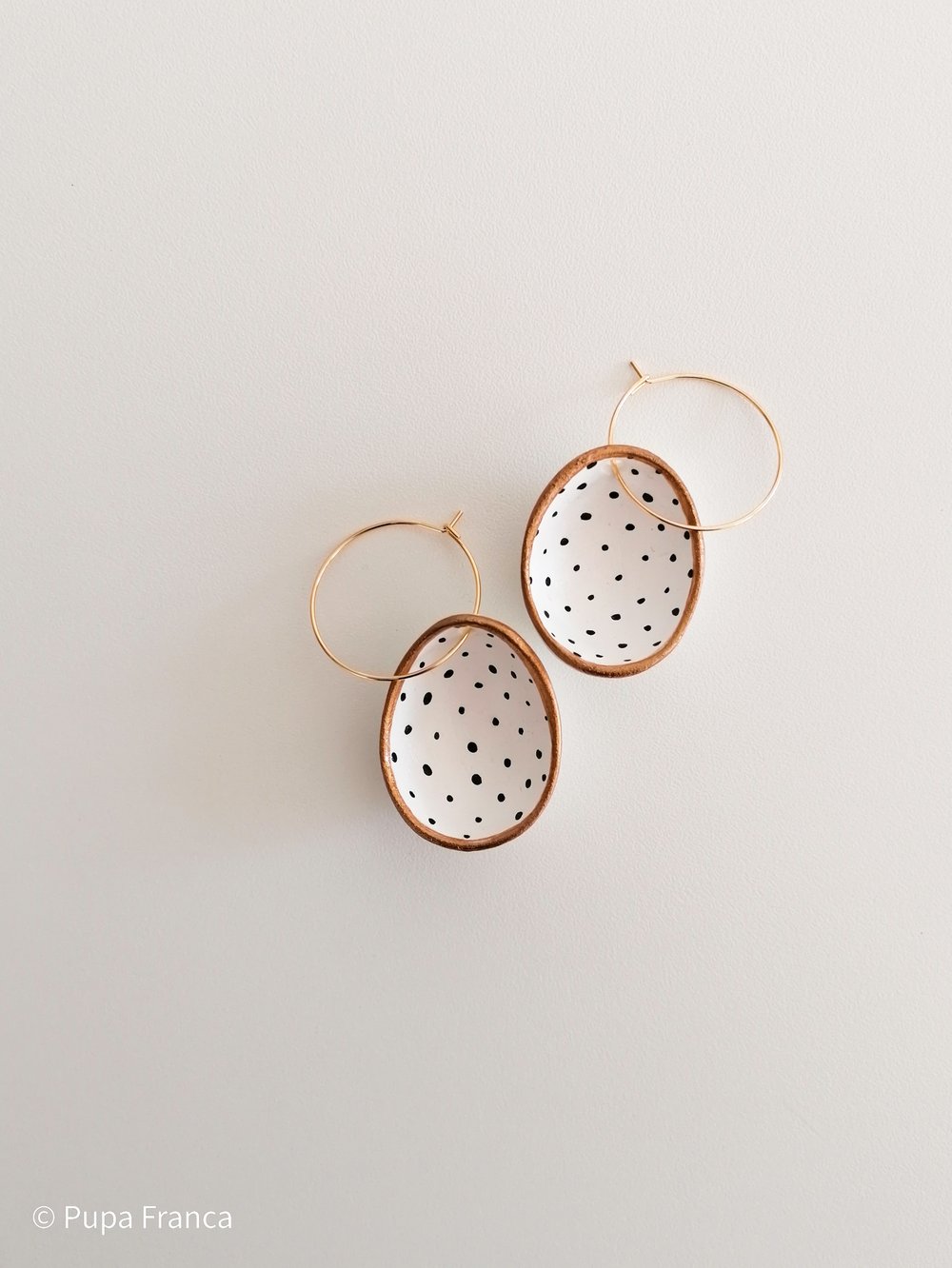 Image of Eggshell Earrings with Black Dots and Golden Edge