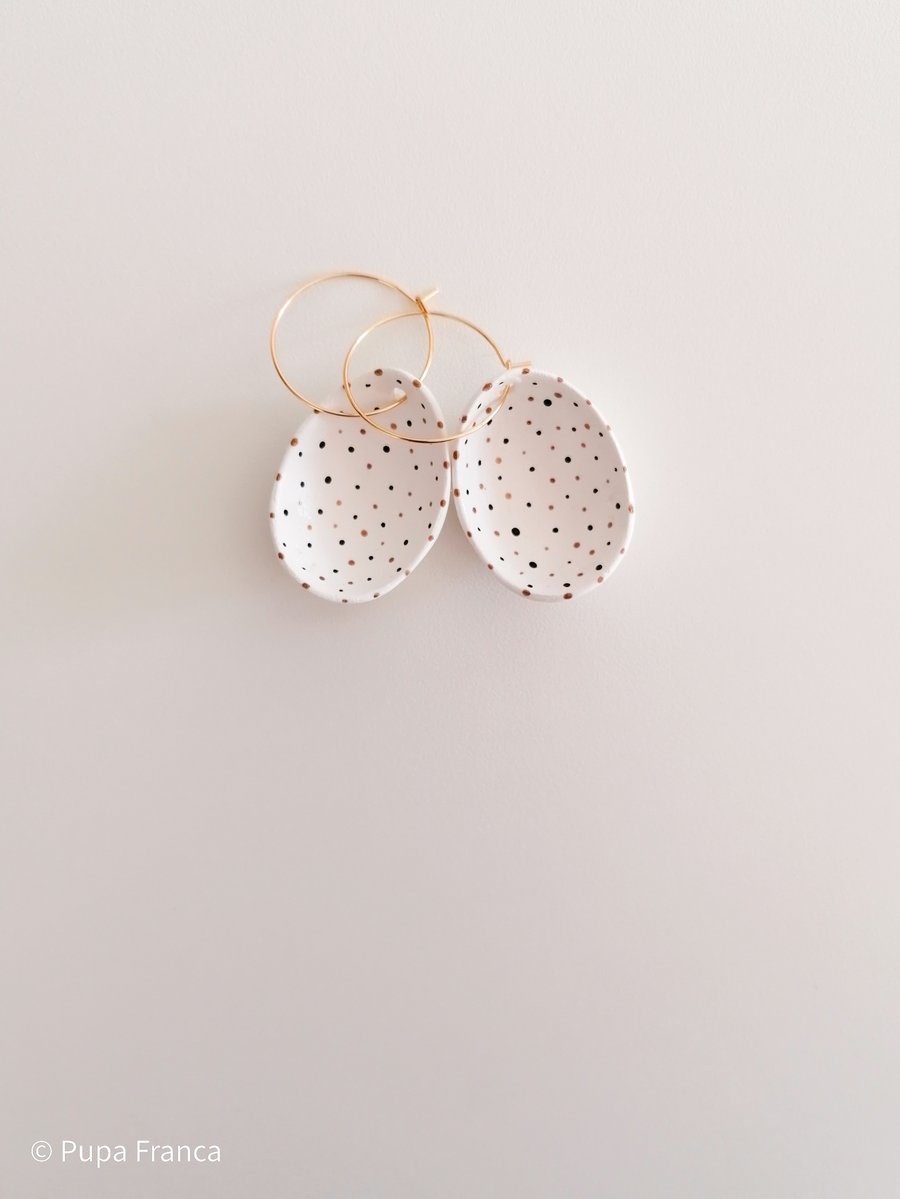 Image of Eggshell Earrings with Black and Golden dots