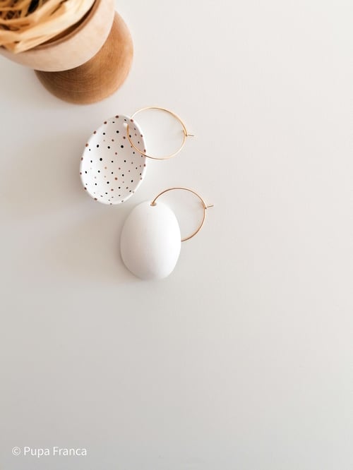 Image of Eggshell Earrings with Black and Golden dots 