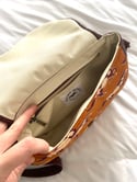 Mustang saddle bag with crossbody strap and short handle