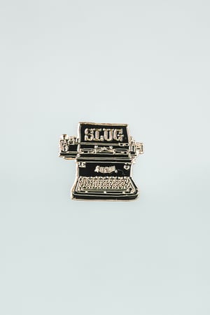 SLUG Typewriter Pin