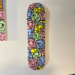 Image of Faces original Skatebord deck.