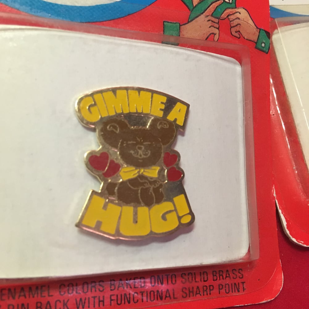 NOS Enamel Pins in original package
