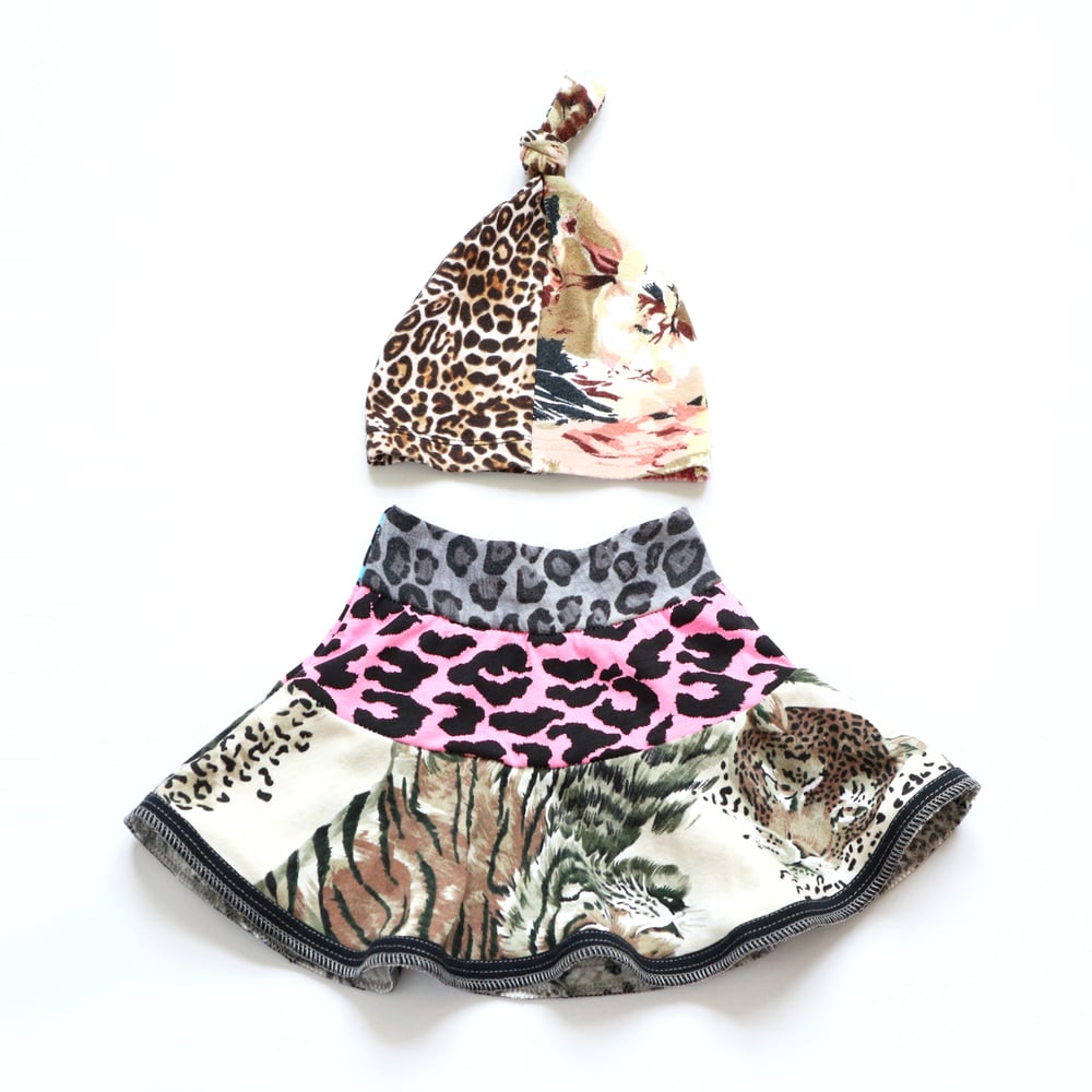 Image of animal print wild baby girl newborn gift set 1/2/3 interlock knot hat baby shower courtneycourtney