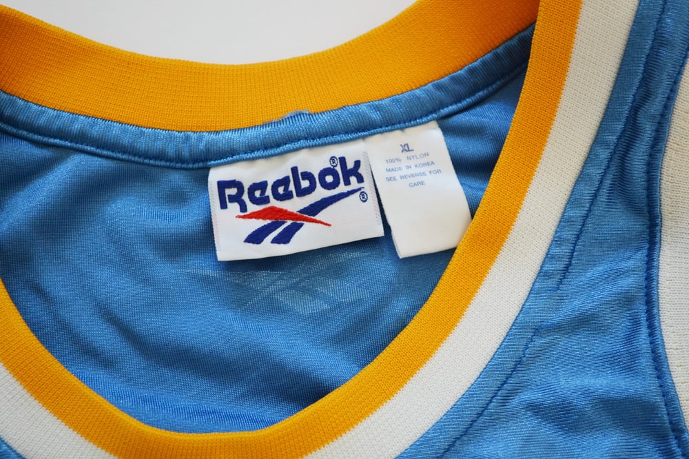 Vintage 1990's UCLA Bruins Charles O'Bannon Reebok Dazzle Jersey Sz.XL