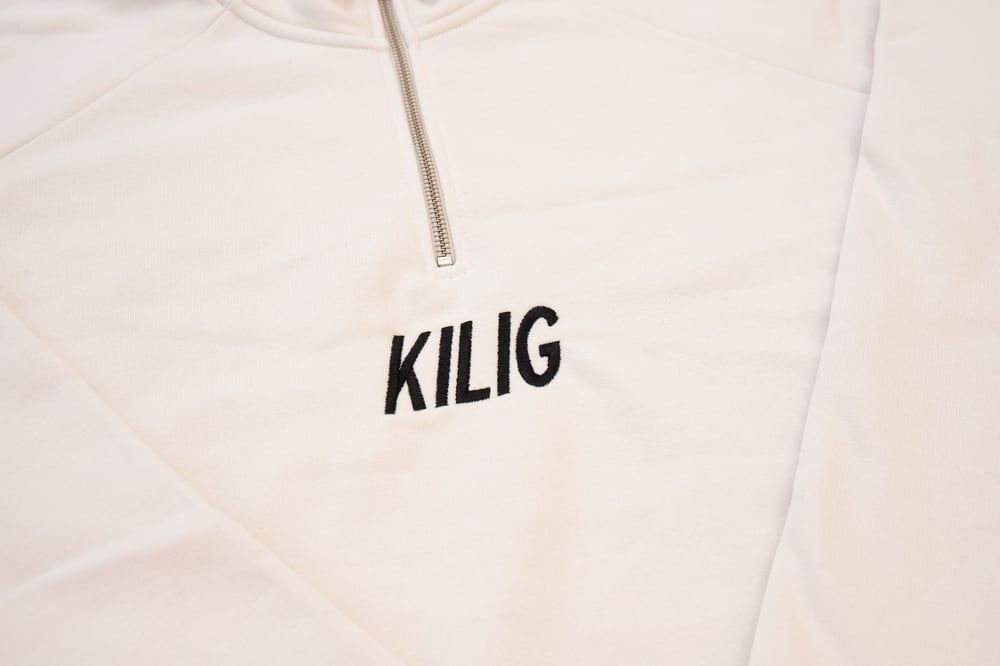Image of RAID YOUR CITY HALF ZIP BEIGE