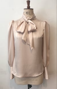 Image 1 of Deep cuff satin tie neck blouse