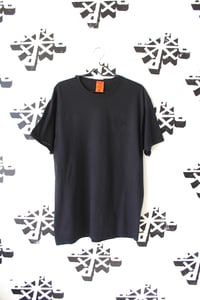 Image of stacked tee in black 