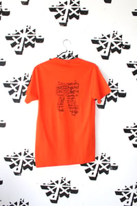 Image of built for both tee in orange 