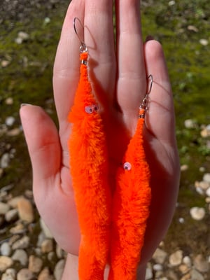 orange worm earrings