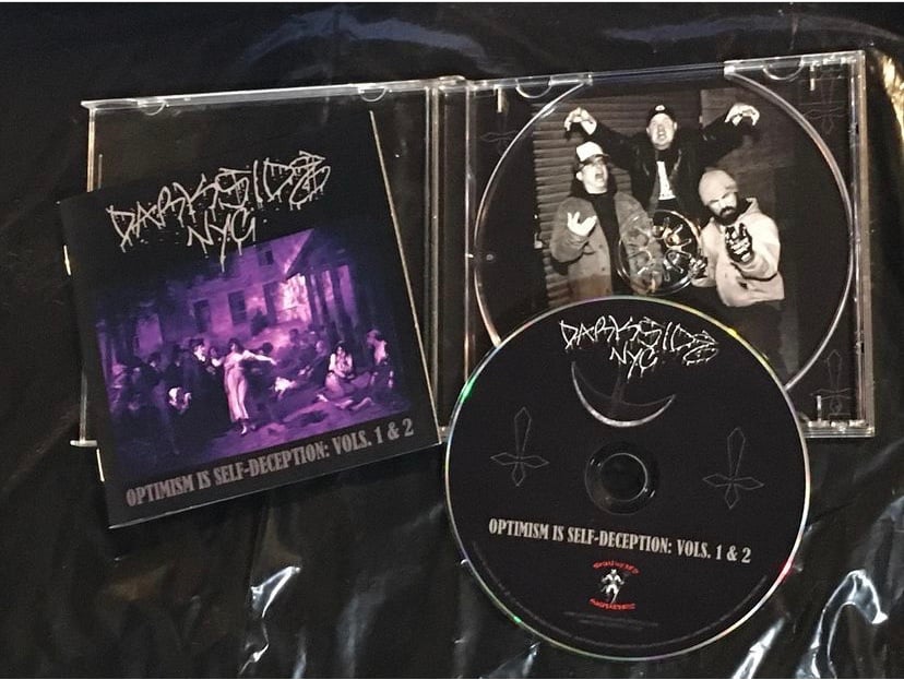 Image of Darkside NYC CD — Optimism Is Self-Deception: Vols. 1 & 2