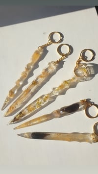 Image 2 of Gold dust defensive charms