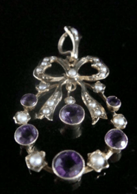 Image 1 of Antique Edwardian 9ct yellow gold amethyst seed pearl bow pendant