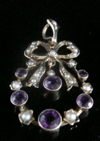 Antique Edwardian 9ct yellow gold amethyst seed pearl bow pendant