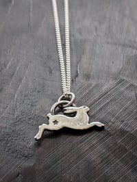 Image 3 of Tiny Leaping Hare hammered recycled silver pendant