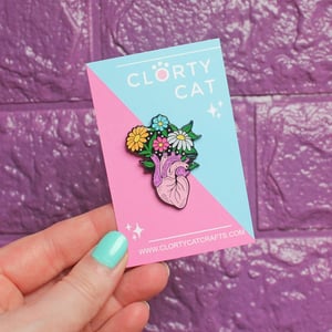 Image of Anatomical heart with flowers enamel pin - floral pin - creepy cute - pastel goth - lapel pin badge