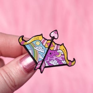 Image of Day & night Bow and Arrow enamel pin - bow pin - creepy cute - pastel goth - lapel pin badge