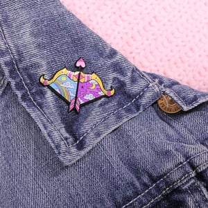Image of Day & night Bow and Arrow enamel pin - bow pin - creepy cute - pastel goth - lapel pin badge