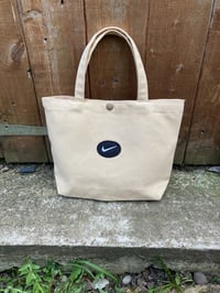 DARK CREAM SWOOSH TOTE BAG