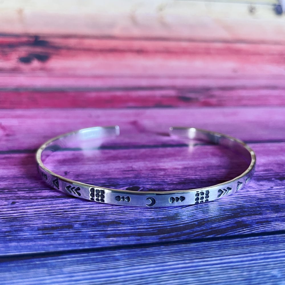 Image of Luna symbol stamped sterling cuff bracelet (4mm wide). Hand stamped silver 925 bracelet.