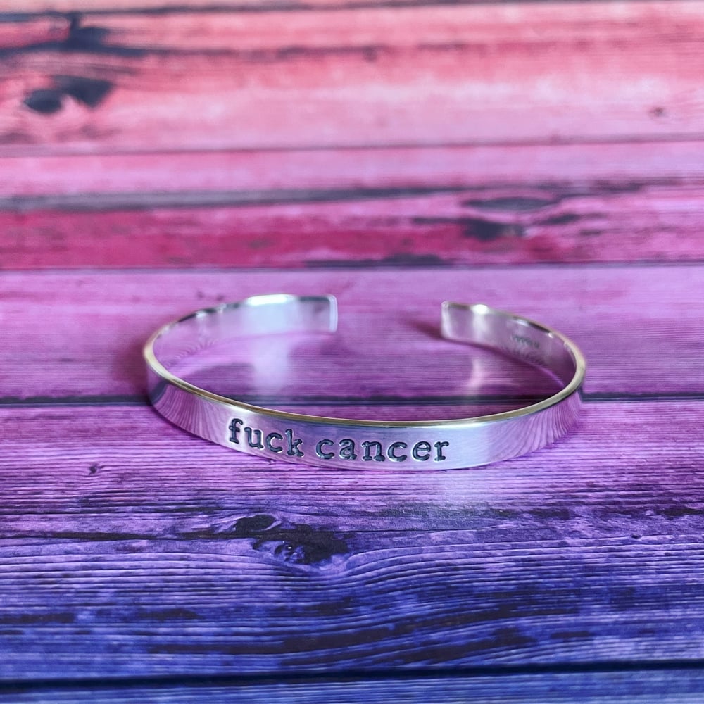 Image of Sterling silver cuff bracelet 'fuck cancer'. Hand stamped silver cuff F*ck cancer 925.