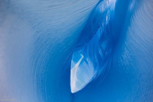 Hole in Blue Iceberg