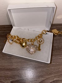 Gold heart charm bracelet 