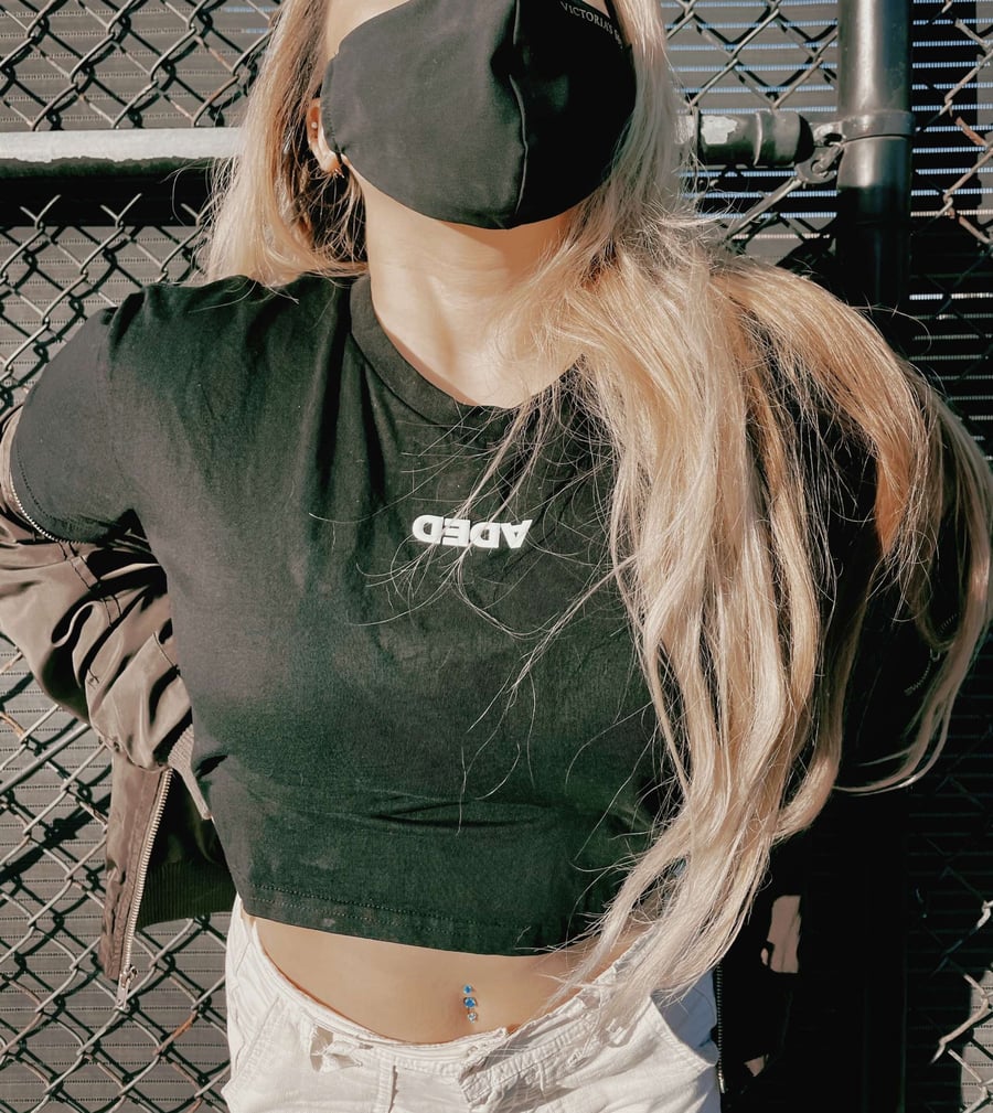 Image of DEDA WOMENS BLACK CROP TEE WHITE LOGO