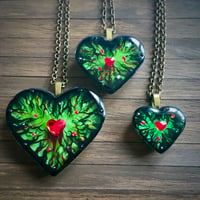 Image 1 of Poison Ivy Resin Heart Pendant
