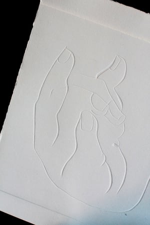 Image of Embossed hands