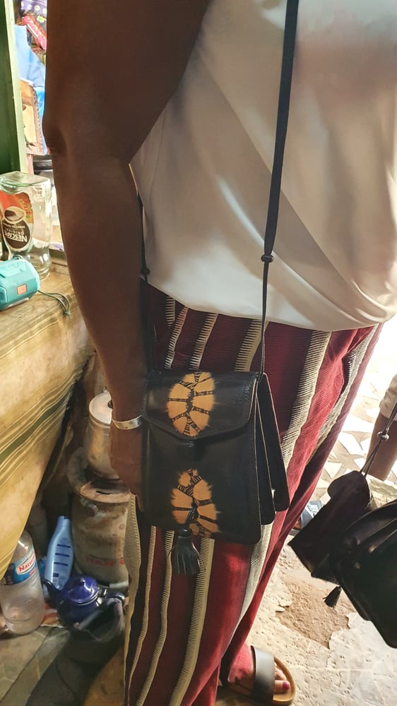 Image of Black leather handbag