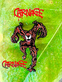 Image 1 of Carnage enamel pin